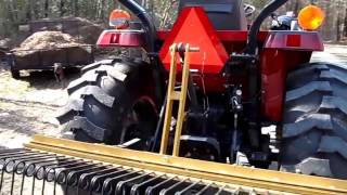 Tractor With Pine Needle Rake from Everything Attachments Vid001 [upl. by Westney]