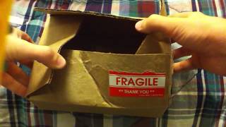 How to fold a Cardboard Box closed [upl. by Raveaux]